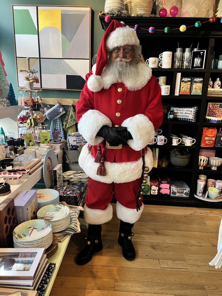 Santa Jim wearing a traditional red suit by Angie's Originals