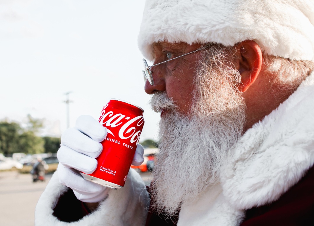 Santa Jim with a classic Coca-Cola bottle