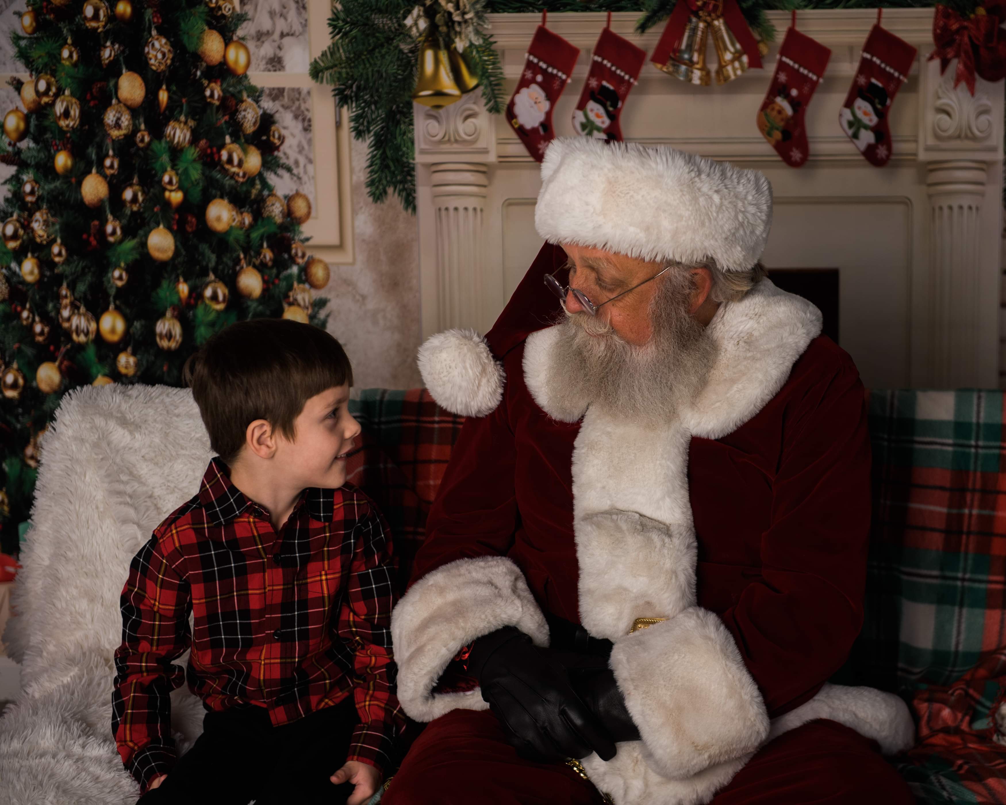 Santa Jim sharing a moment with a child