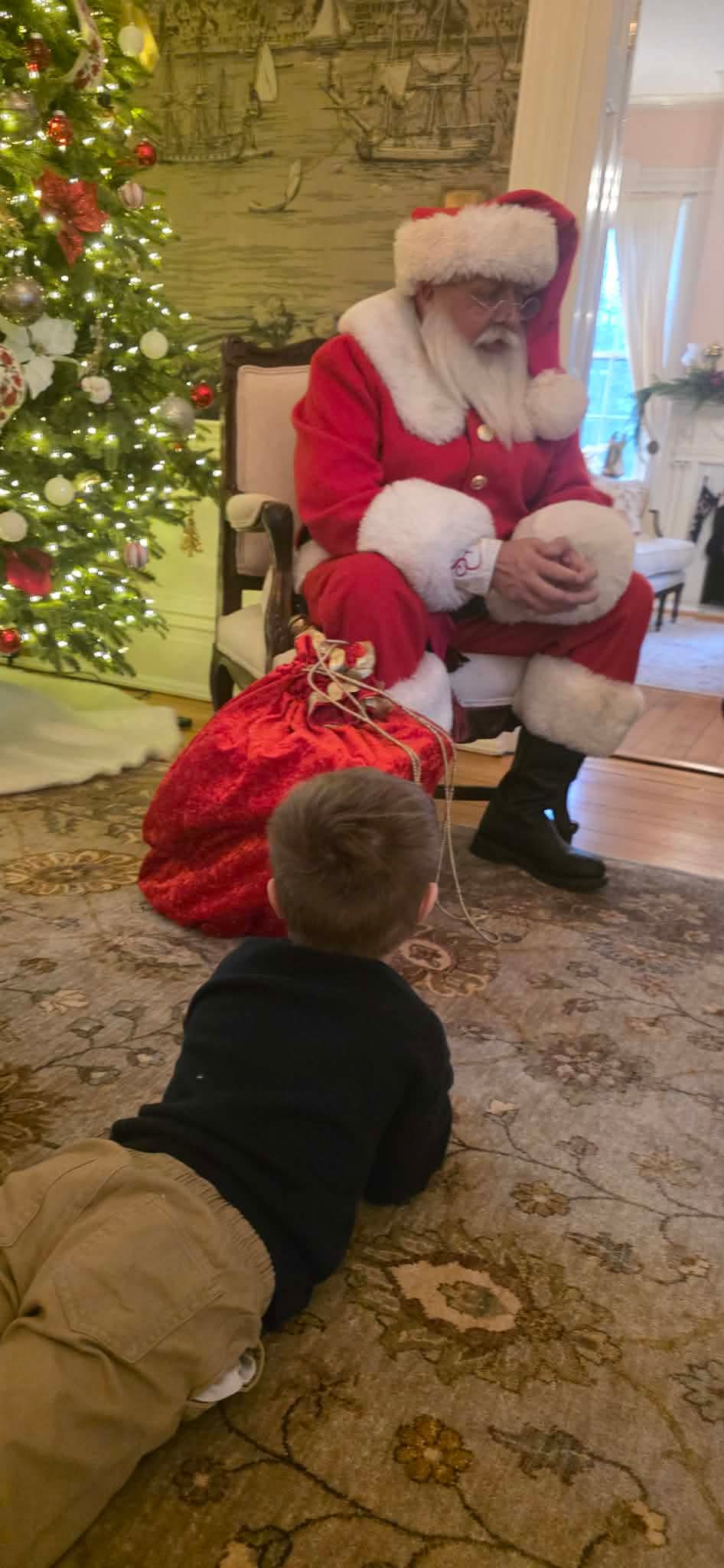 Santa Jim visiting a family home