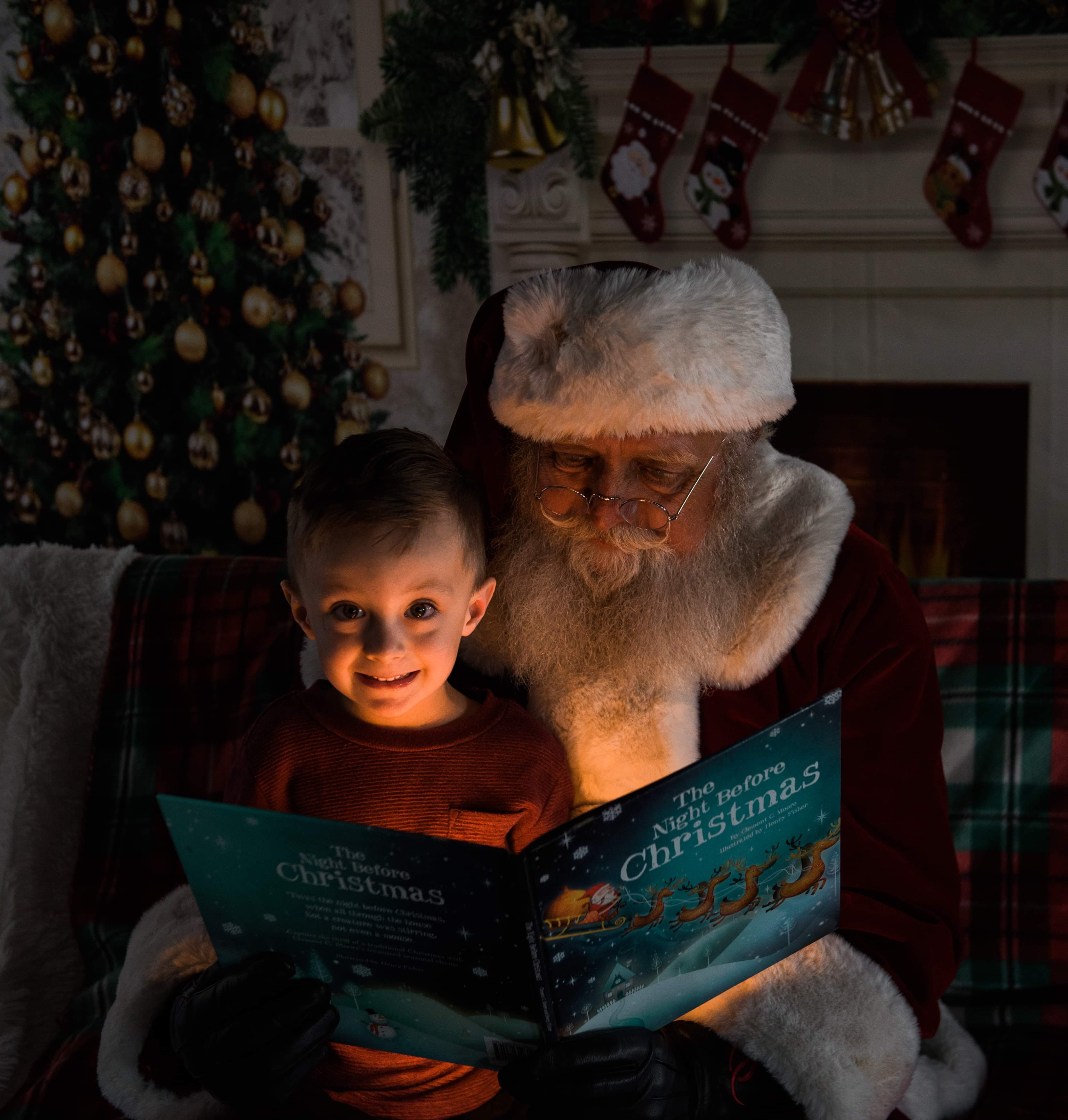 Santa Jim sharing a Christmas story with a child